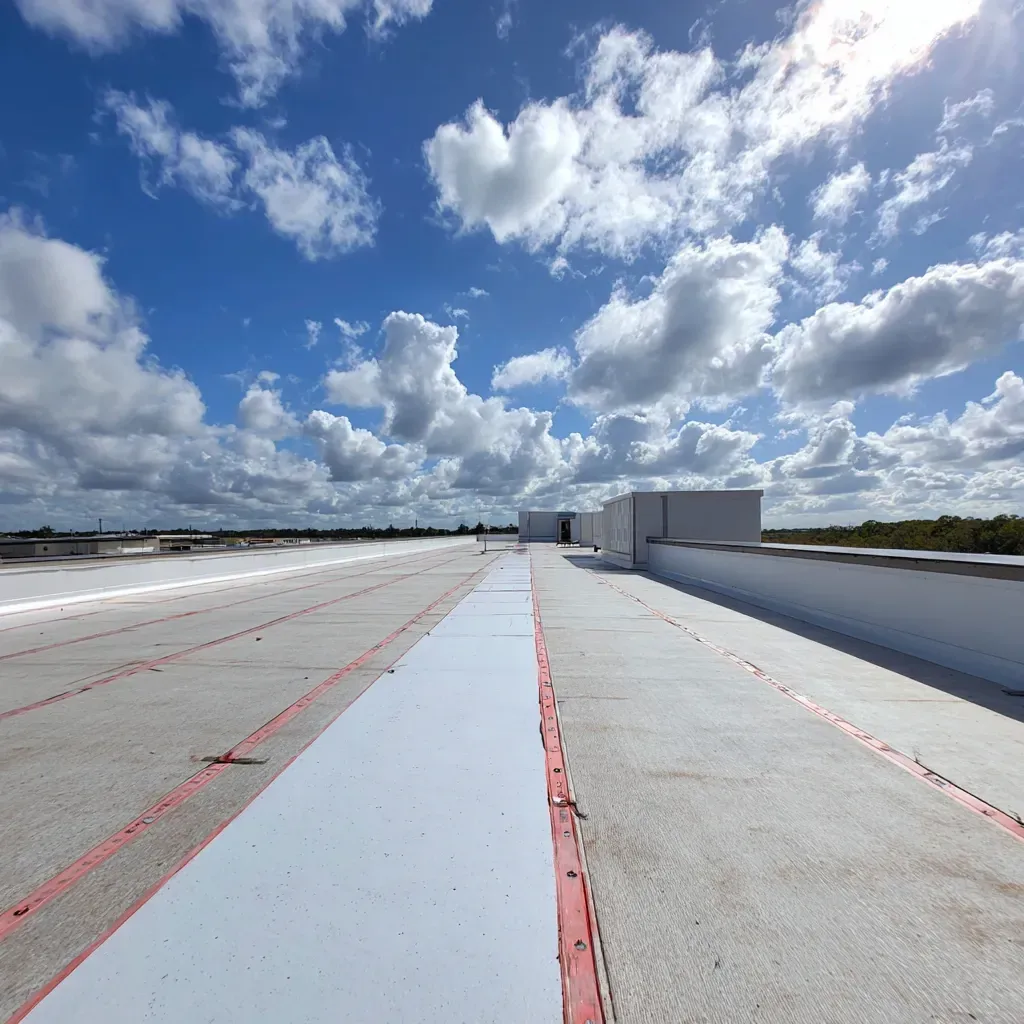 Commercial flat roof installation Lehigh Acres FL with project documentation, before/after drone photos, and punch list execution.