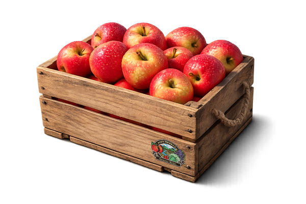 Wooden crate overflowing with red and yellow apples.