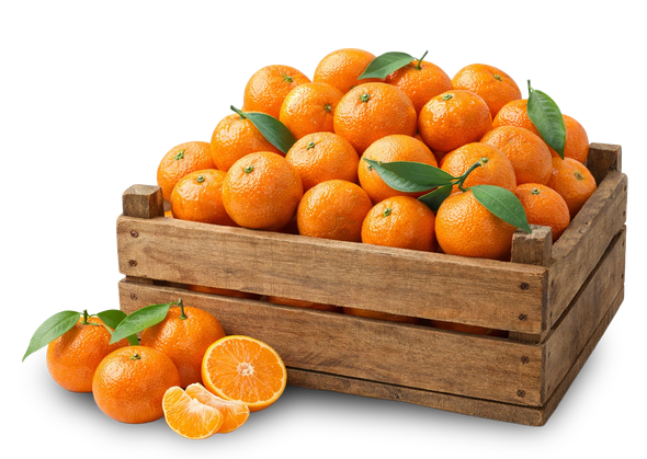 Wooden crate overflowing with red and yellow apples.