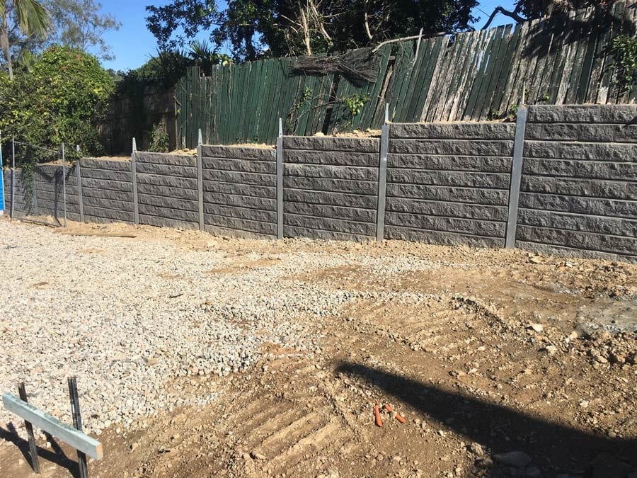 Charcoal Splitface Concrete Sleeper Retaining Wall with Fence Brackets – House Pad — in Gold Coast, QLD
