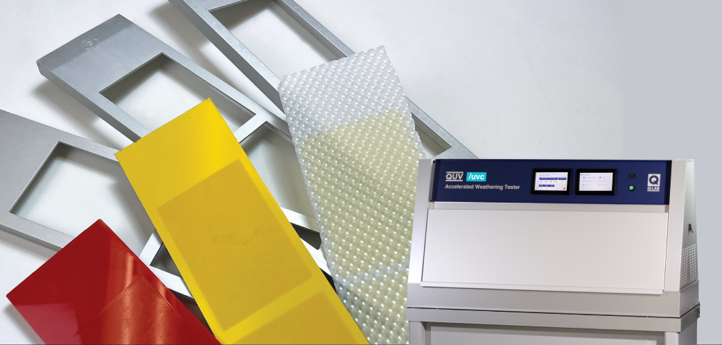 Una máquina está sentada junto a un montón de plásticos de diferentes colores.