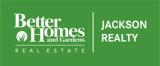 The logo for better homes and gardens real estate