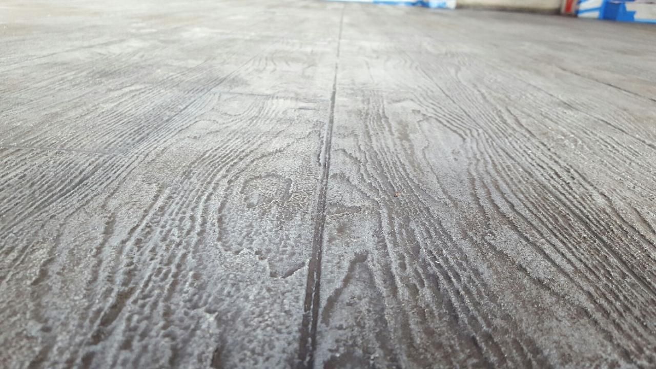 Custom wood look concrete slab with detailed plank pattern
