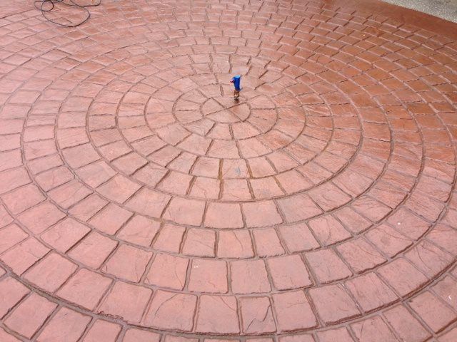 Lacey WA stamped concrete patio with radial stone finish