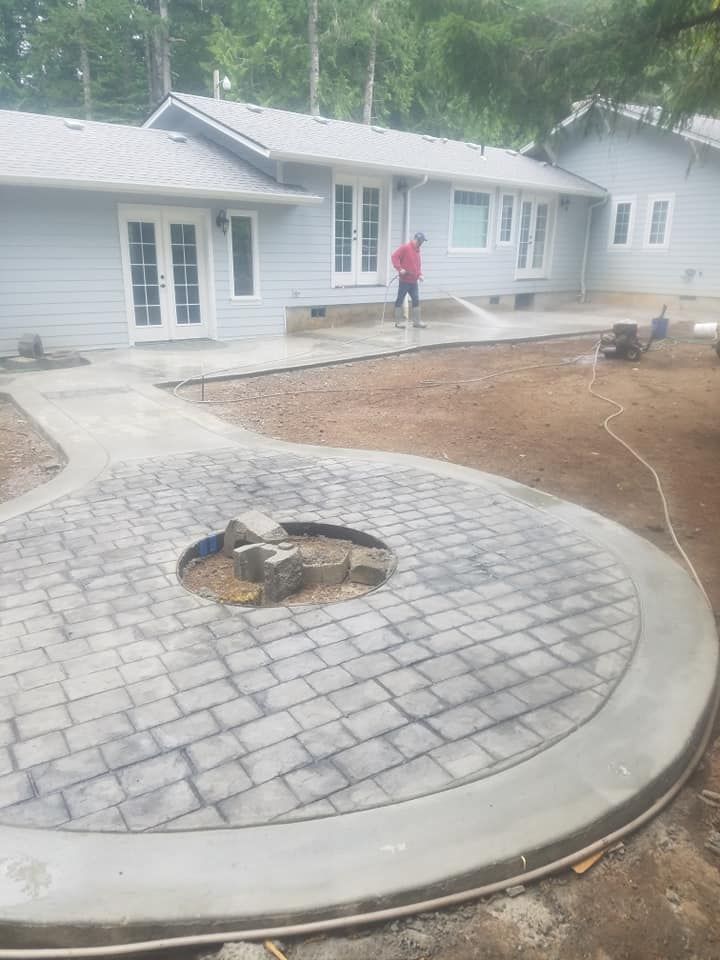Residential concrete pathway installation with custom border detail