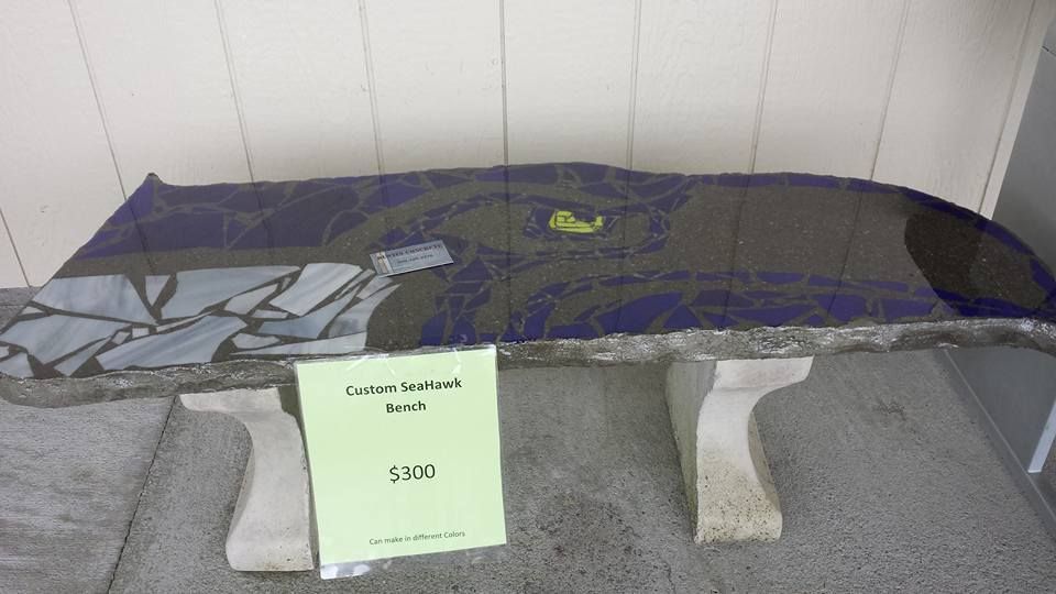 Custom decorative concrete bench with Seahawk mosaic design