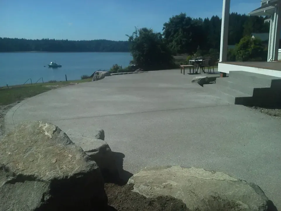 Custom outdoor concrete patio installation on the water in Olympia, WA
