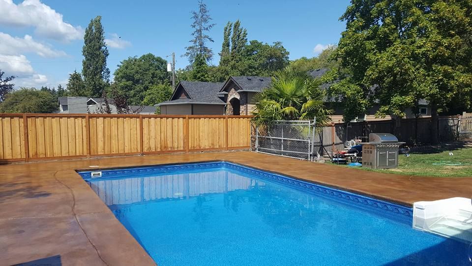 Custom concrete poolside flatwork with clean edge detail