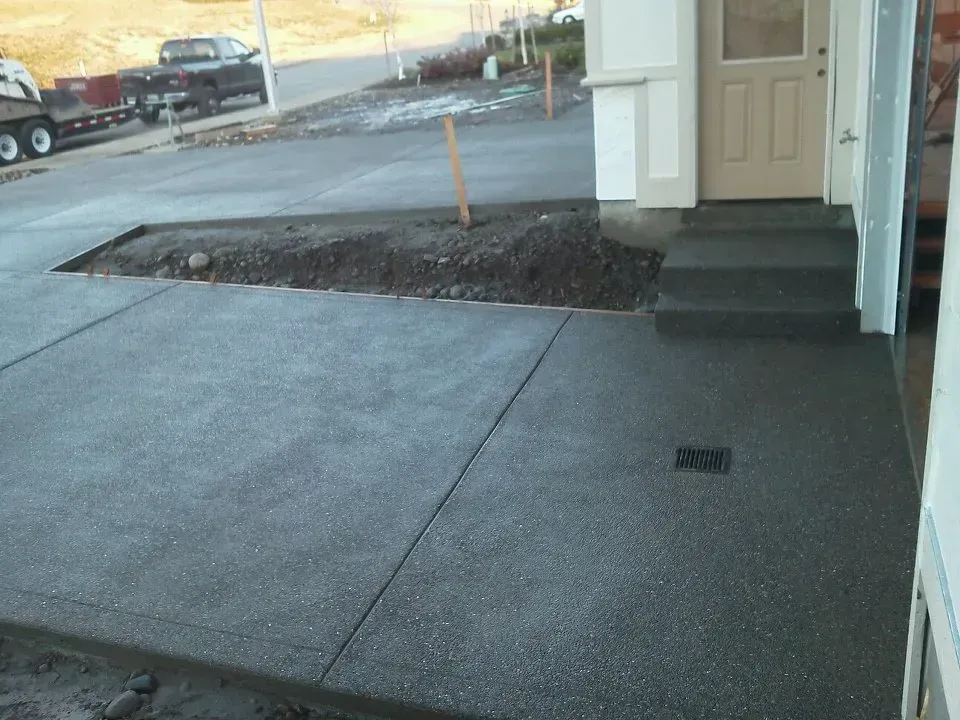 Decorative aggregate concrete patio with textured non-slip finish