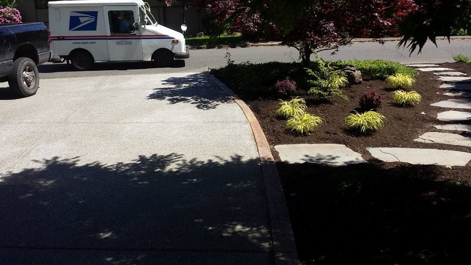 Slip-resistant exposed aggregate flatwork for daily vehicle traffic