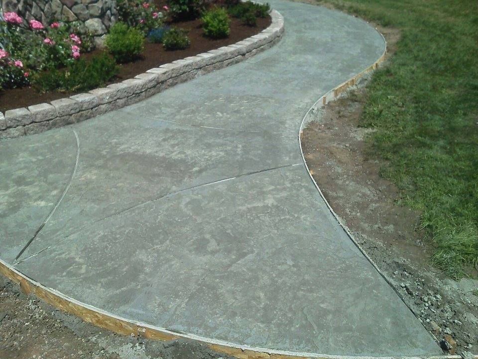 Backyard garden path with flowing curved layout

