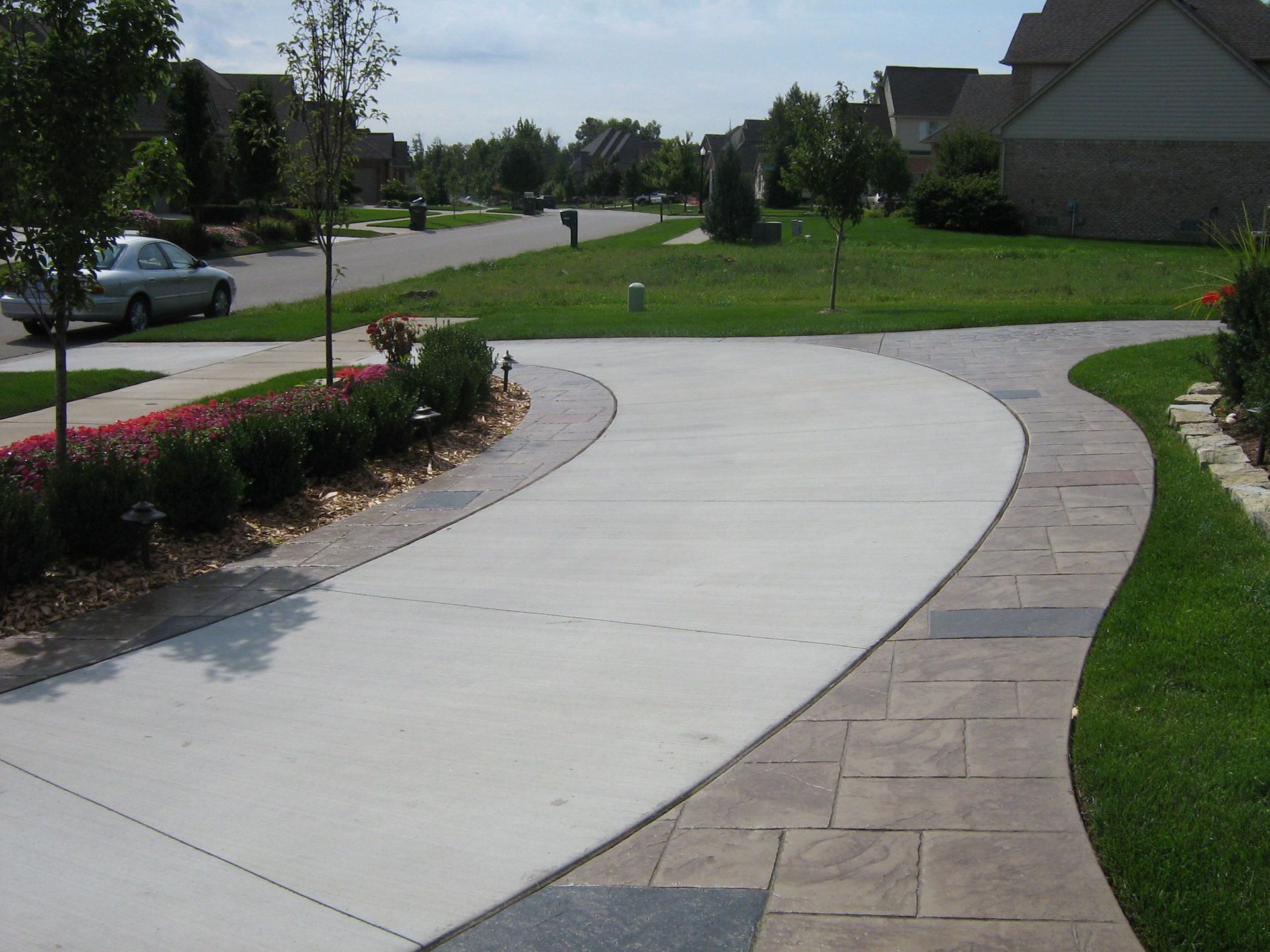 Image of a driveway being repaired and resealed.