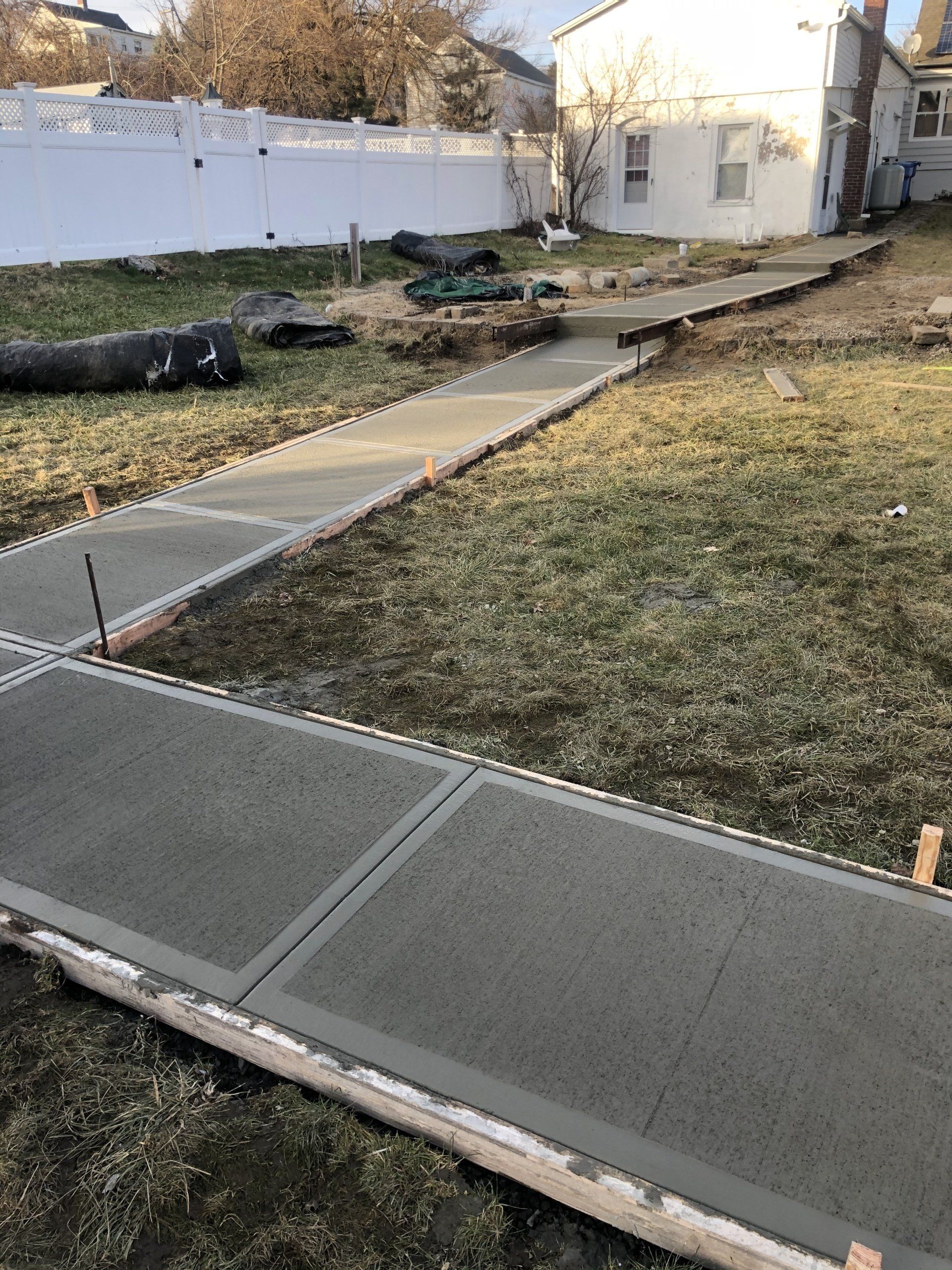 Image of a driveway being repaired and resealed.