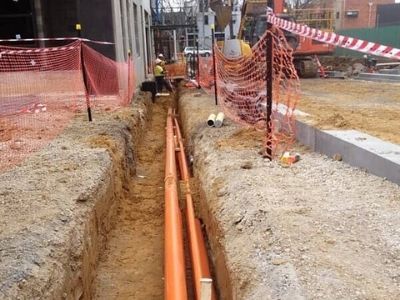 Orange underground pipes found by professional utility locators in Wollongong