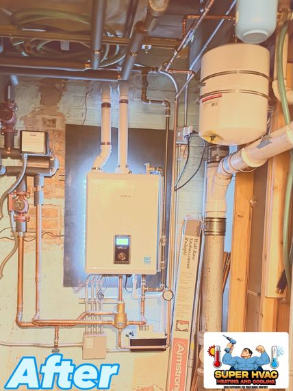 A before photo of a boiler and related piping installed on a painted concrete wall.