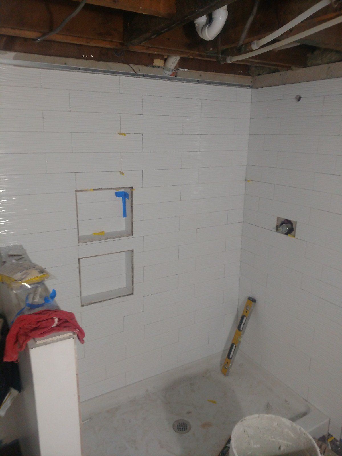 Comfort Room Renovation — Fixing Tiles of Comfort Room in Allenstown, NH
