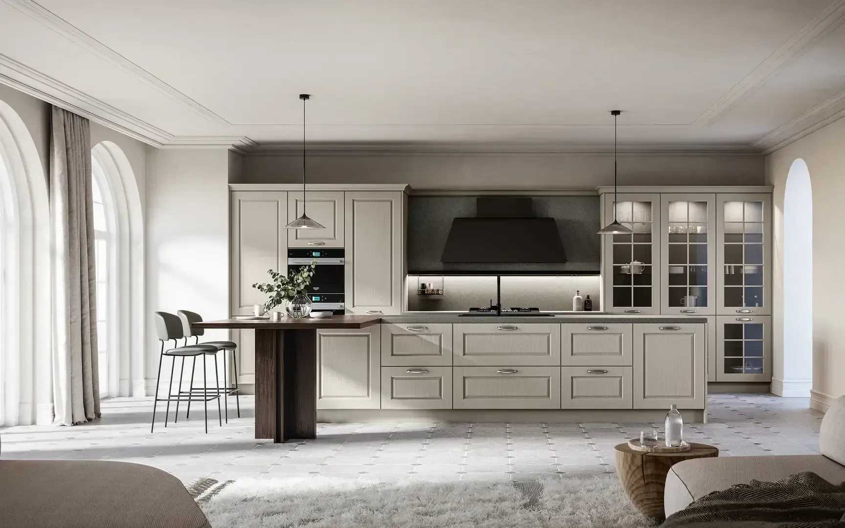 Cucina moderna e luminosa con mobili chiari, isola, lampade a sospensione e grandi finestre