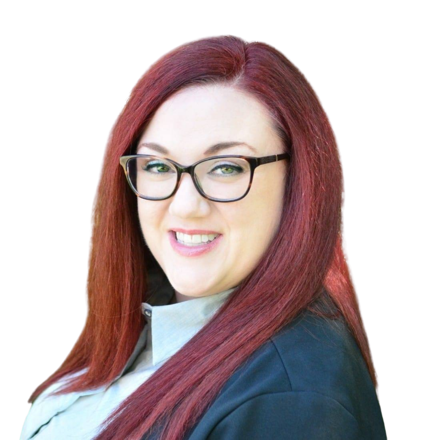 A man in a suit and tie is smiling for the camera.