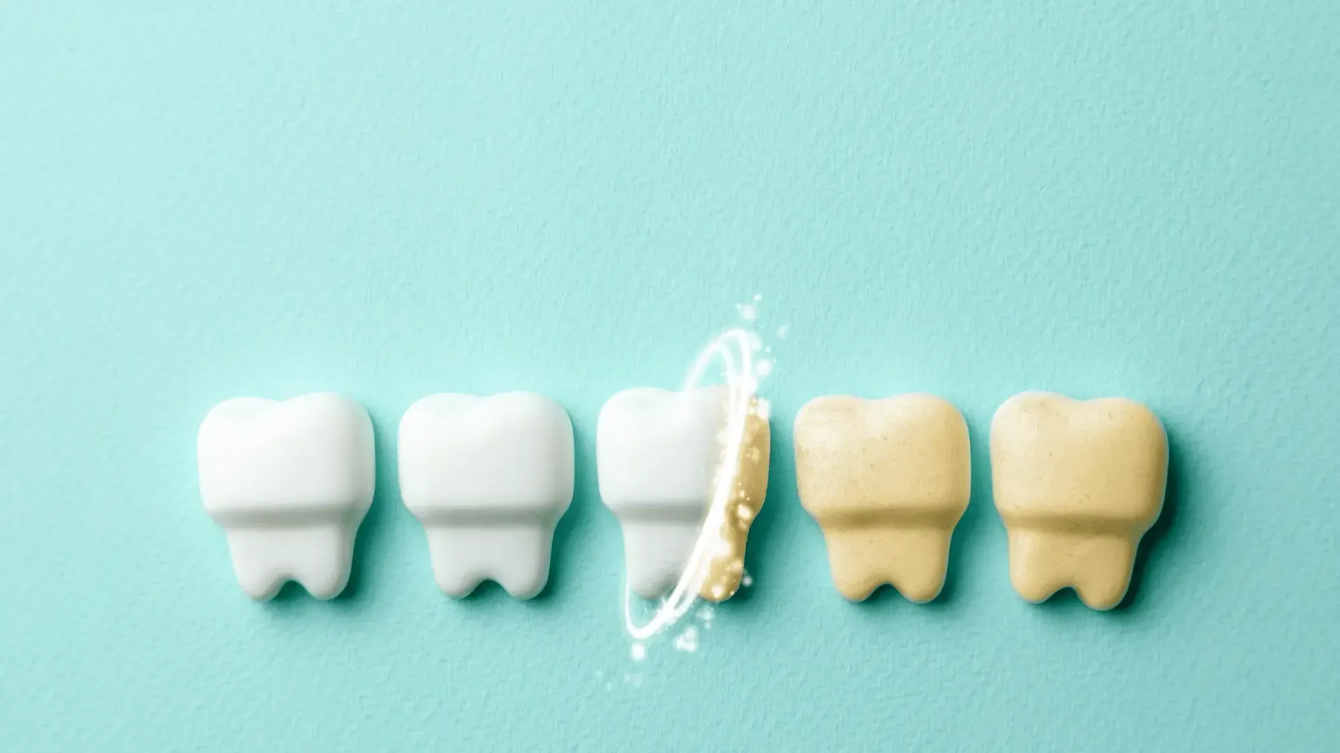 A row of white teeth next to a row of yellow teeth on a blue background.