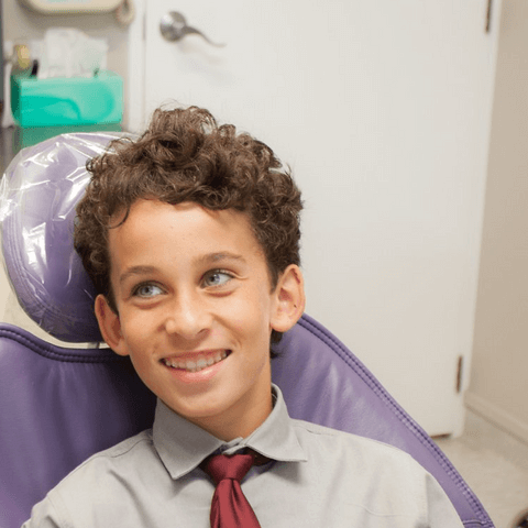 Smiling Kid Having Dental Check Up | Duxton Dental Christchurch Orthodontists