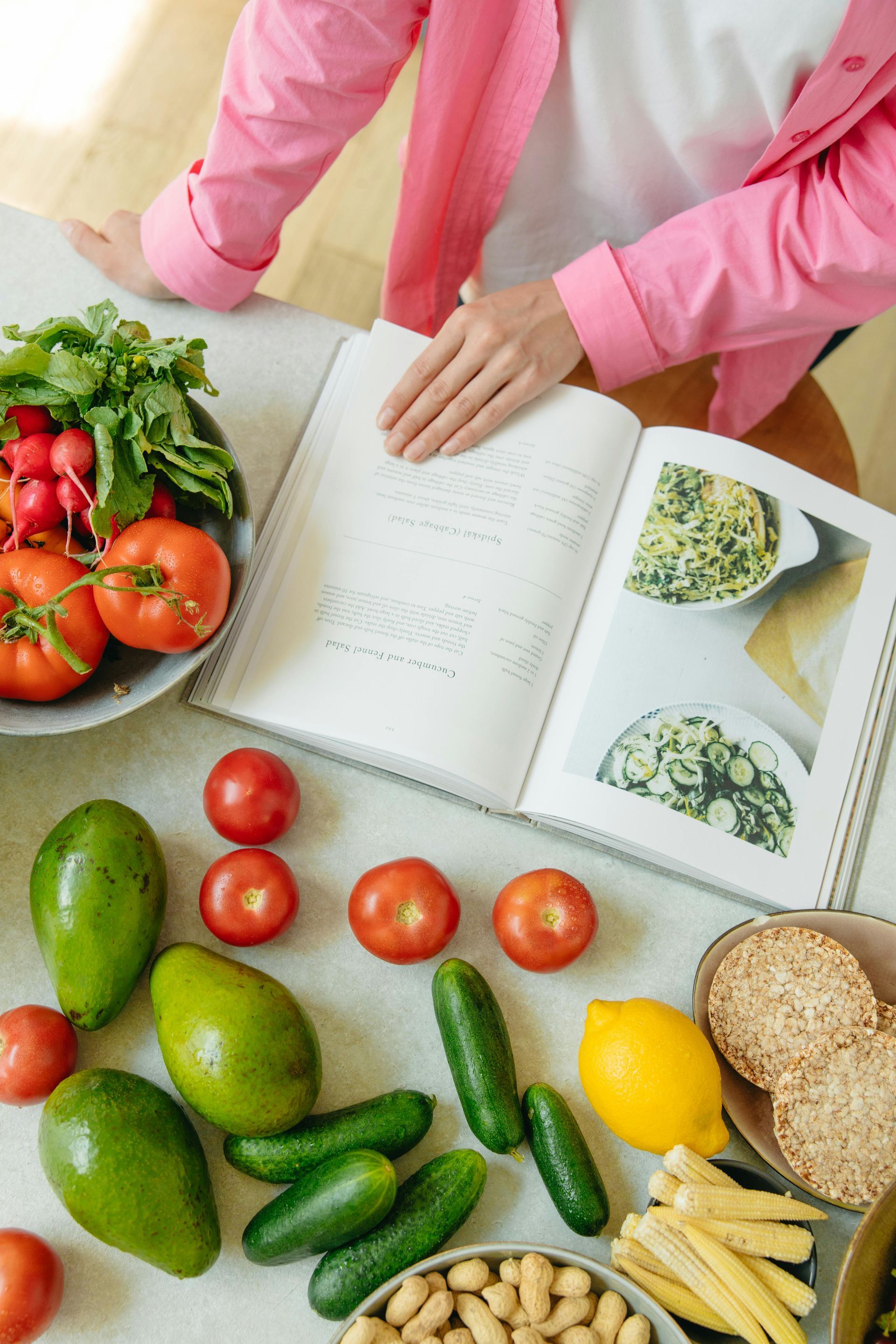 Female reviewing her cookbook