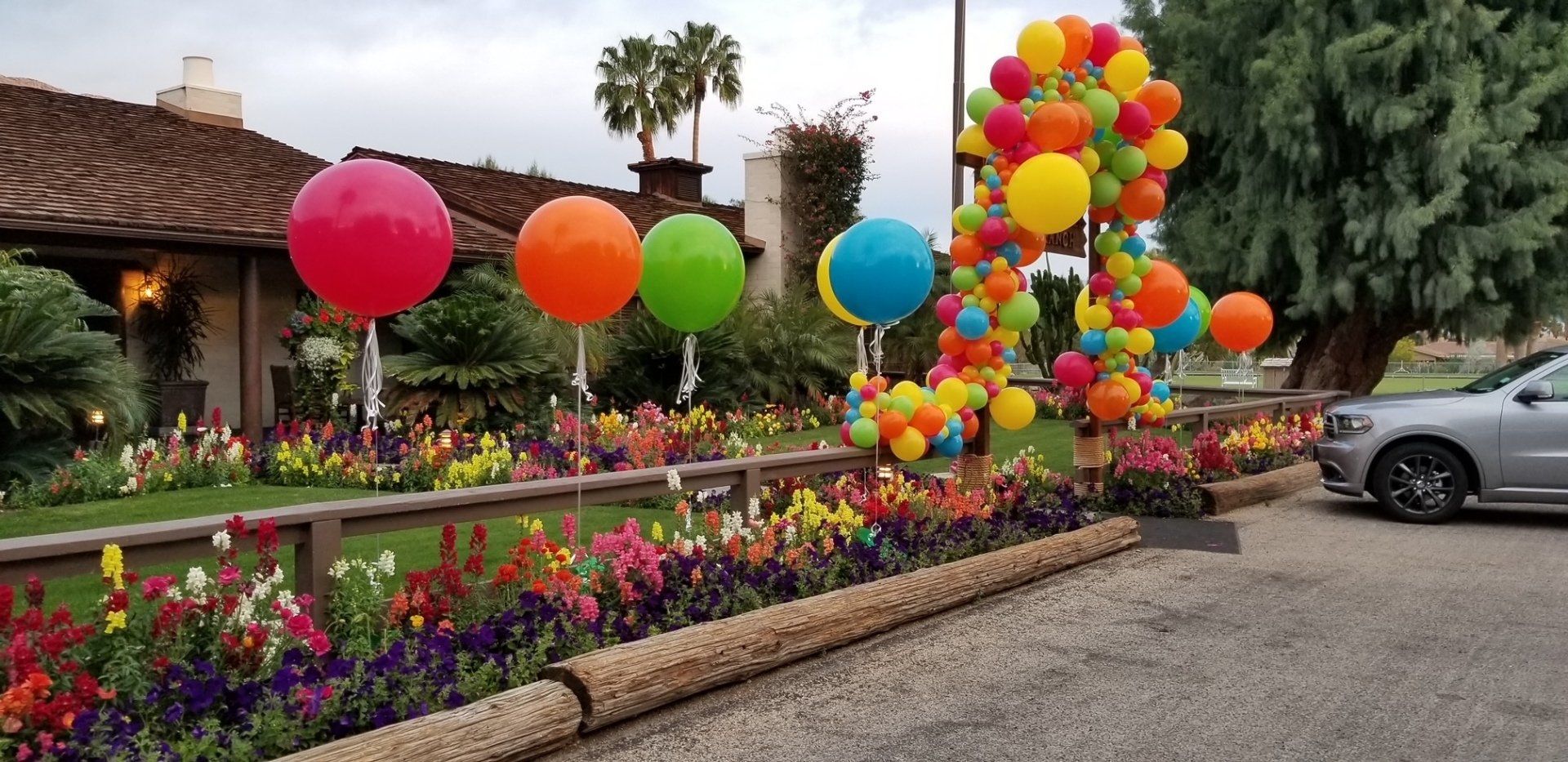 Pink, Orange, green & blue balloons