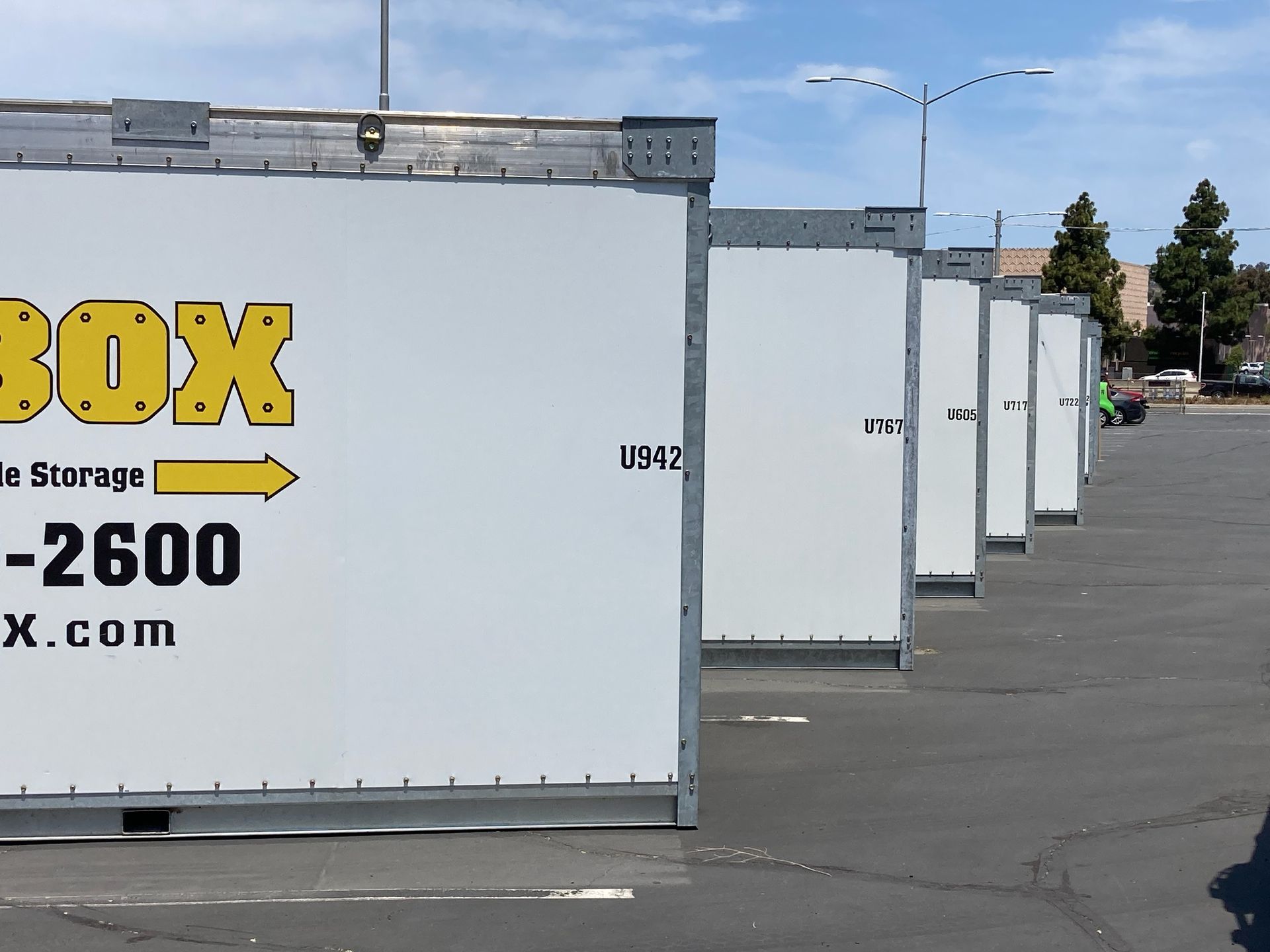 mi box storage containers lined up outside