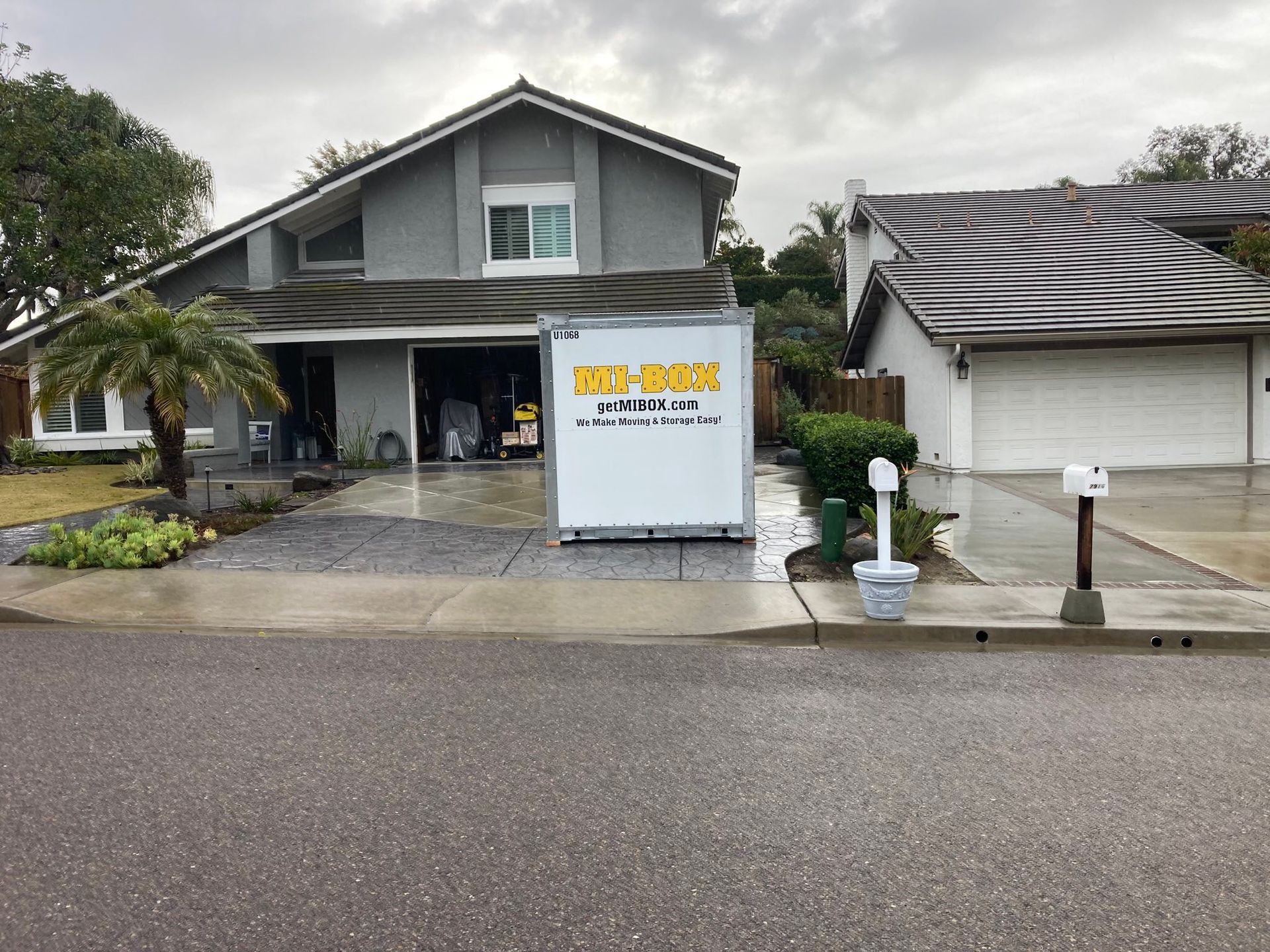 A house with a white box in front of it that says rv rental