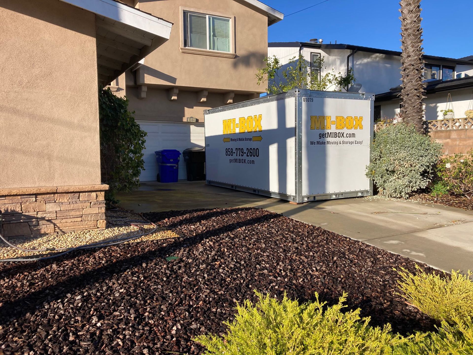 A house with a white box in front of it
