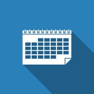 Calendário branco sobre fundo azul.
