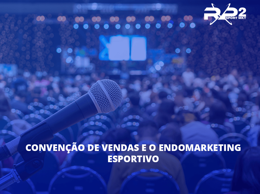 Microphone in front of a crowded auditorium with text: