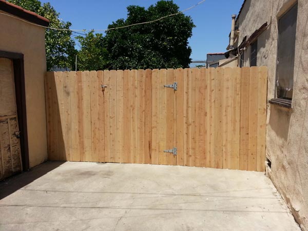 Wooden Fence with Gate — Installation in Inglewood, CA - King Dave Fence