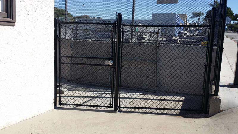 Black Chain Link Fence — Installation in Inglewood, CA - King Dave Fence