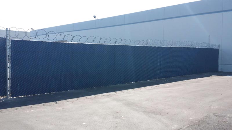 Commercial Chain Link Fence with Barbed Wire — Installation in Inglewood, CA - King Dave Fence