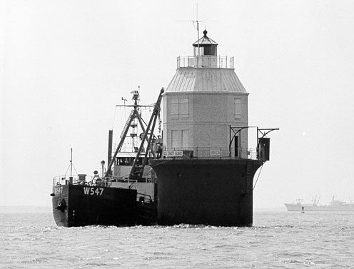 old black and white photo of the lighthouse's construction