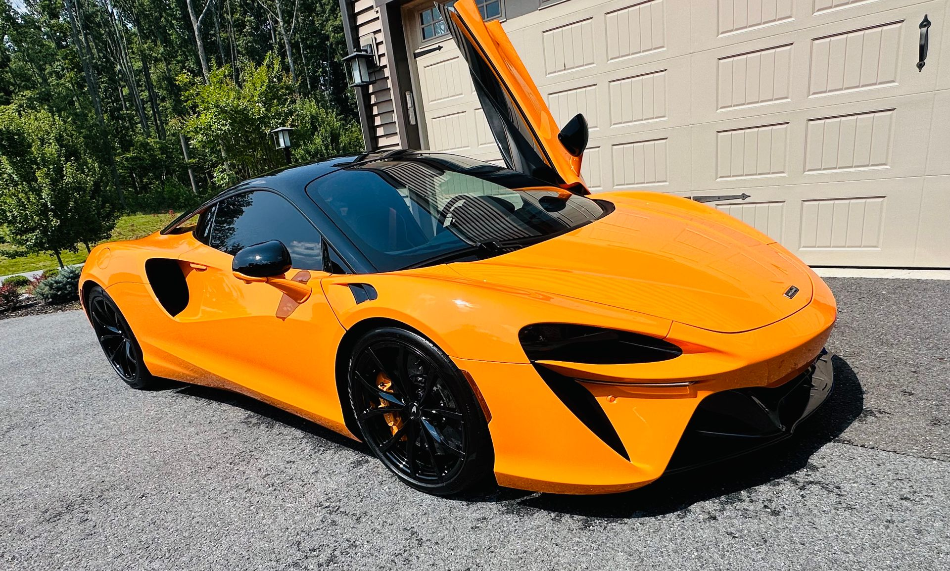 an orange car with professionally applied ceramic coating