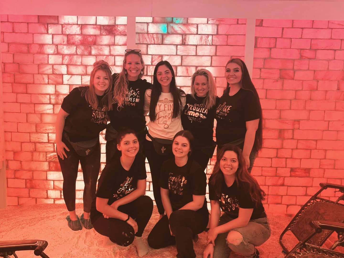 Luxury spa salt room with warm ambient glow, Himalayan salt bricks and serene atmosphere for rest and rejuvenation for groups