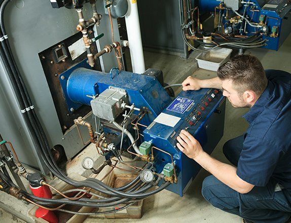 Electrician Inspecting Electric Generator — Clairsville, OH — Bryan Electric Inc.