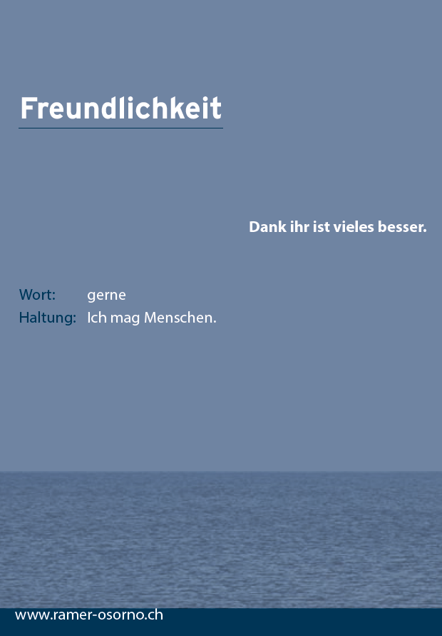 Ein blaues Plakat mit der Aufschrift „Freundlichkeit“