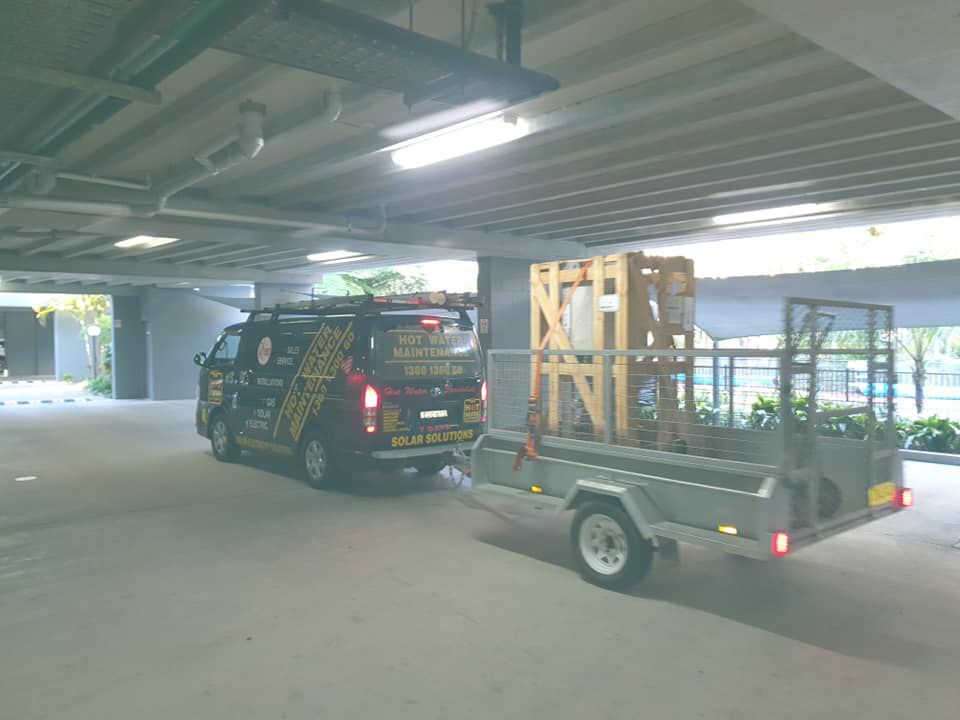 Two delivery vehicle — Hot Water Maintenance in Wauchope NSW