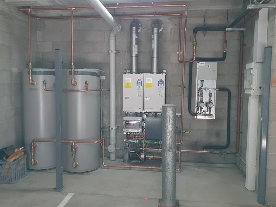 Water heater tank in the room — Hot Water Systems in Crescent Head, NSW