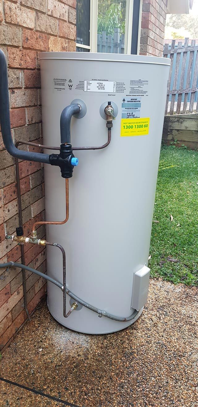WAter heater tank at the backyard — Hot Water Plumber in Port Macquarie NSW