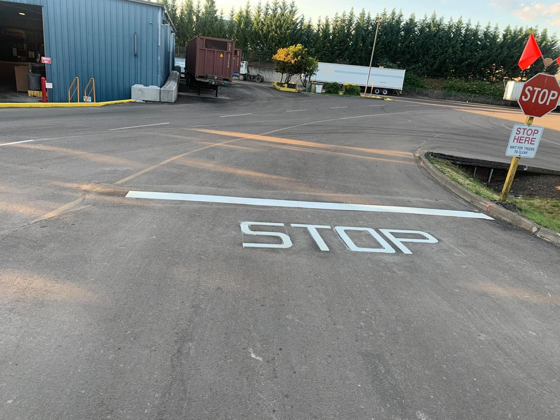 A colorful hopscotch game is painted on the ground