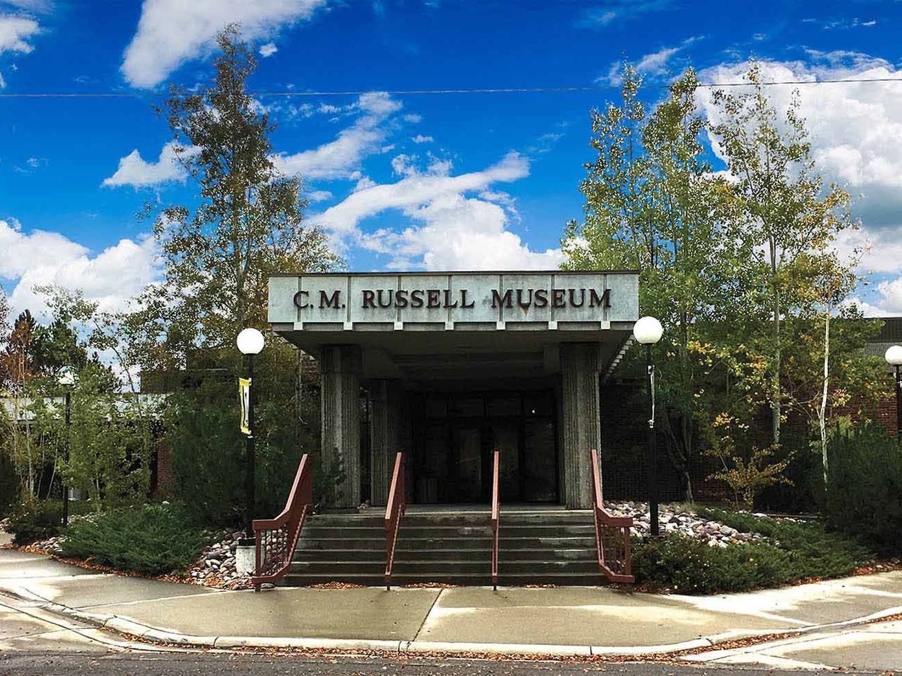 The entrance to the cm russell museum with stairs leading up to it