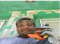 Worker Doing Caulking and Patching — Broward County, FL — Professional Prep & Paint, LLC