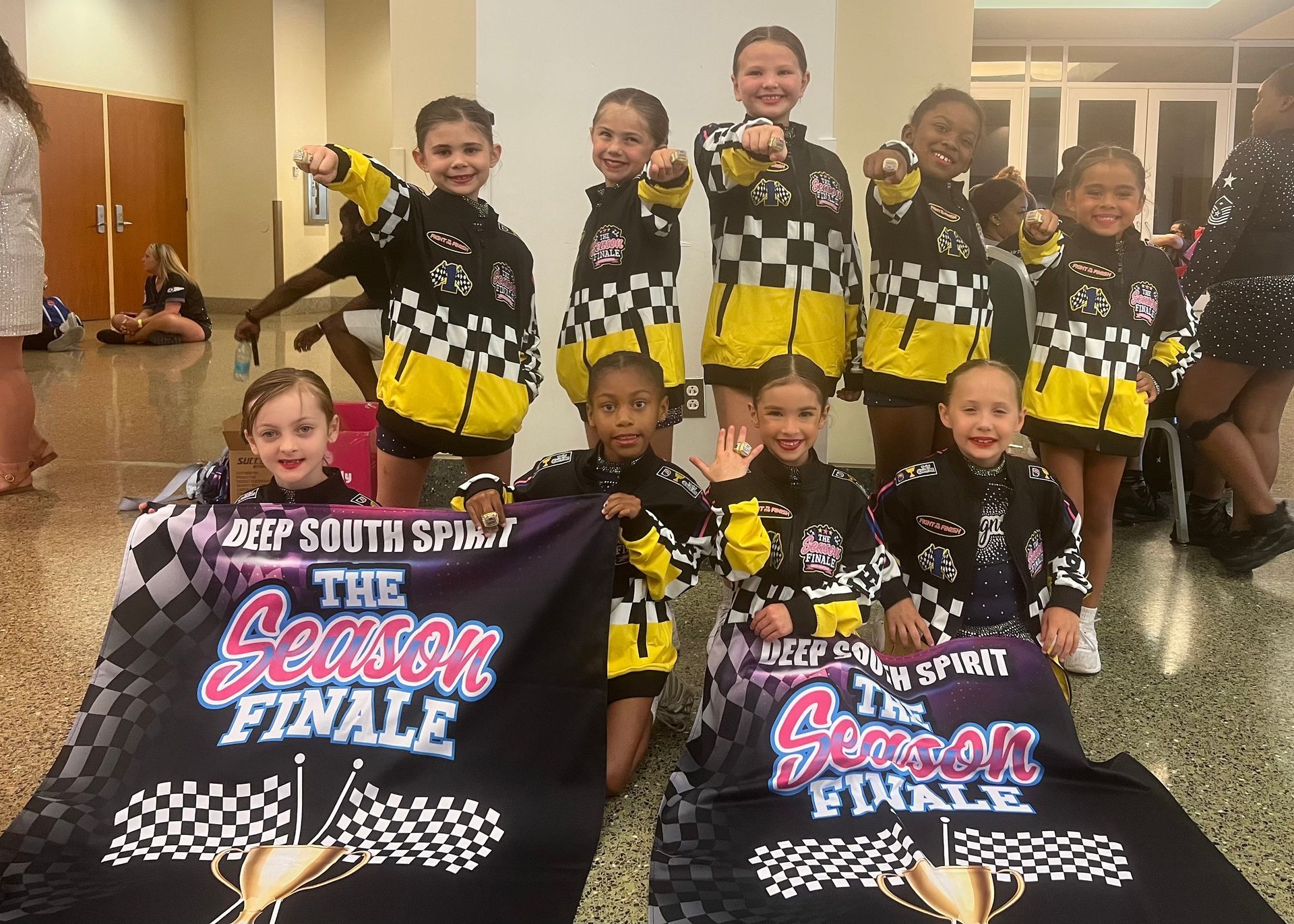 Cheerleaders pose with 