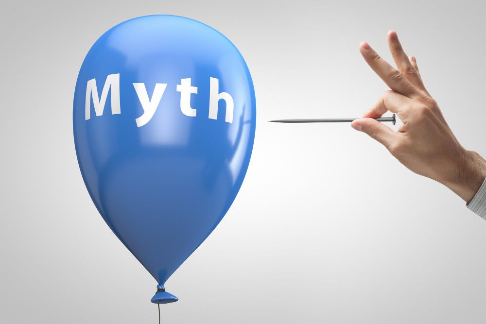 A blue balloon with the word myth written on it