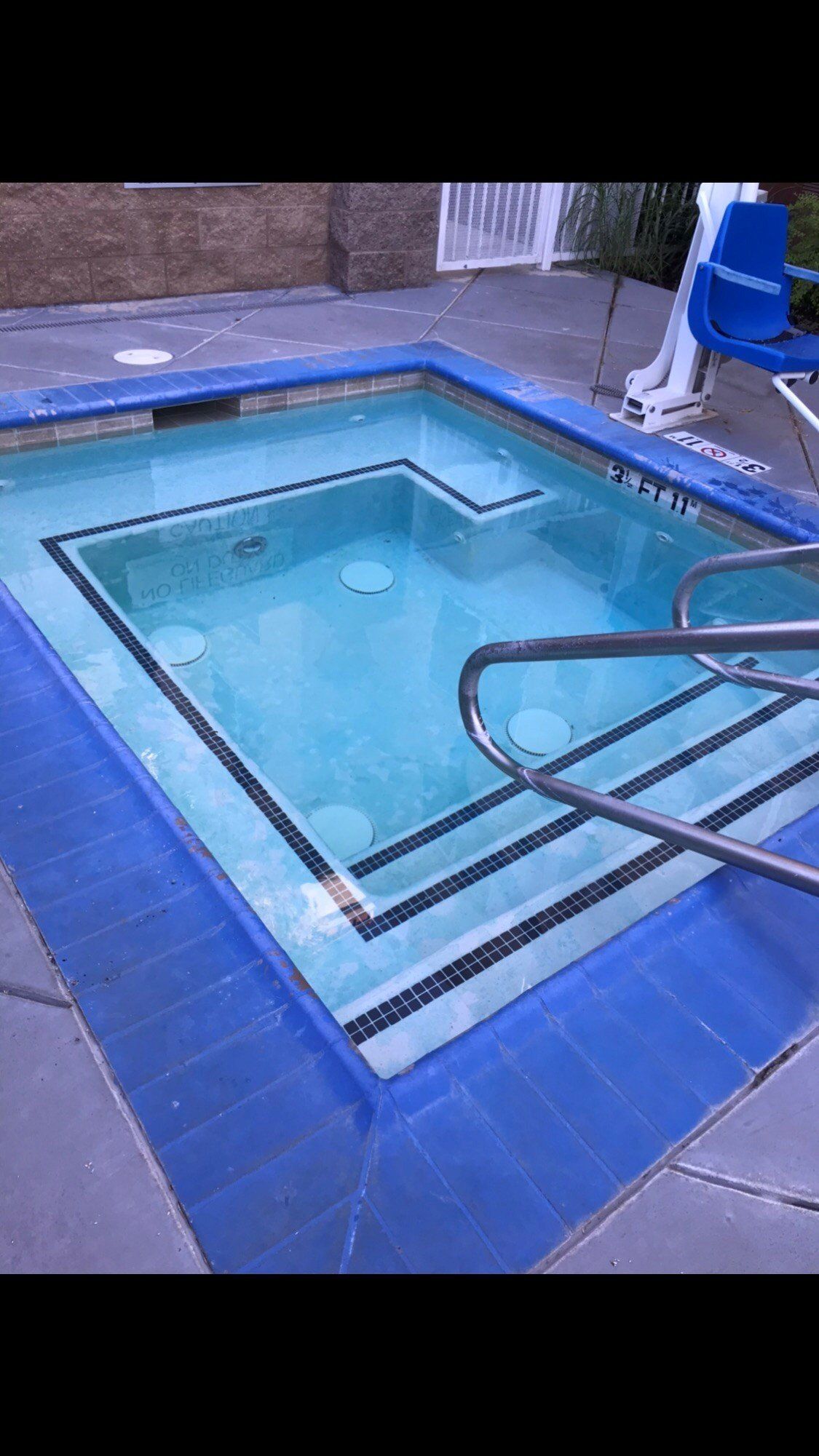 Blue Chair Beside Swimming Pool | Denair, CA | JG Underwater Pool Service