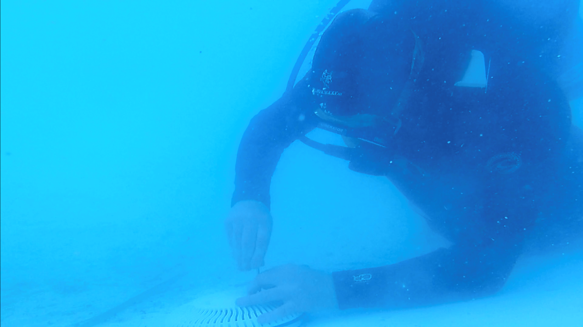 Scuba Diver Cleaning Swimming Pool Drain Cover | Denair, CA | JG Underwater Pool Service