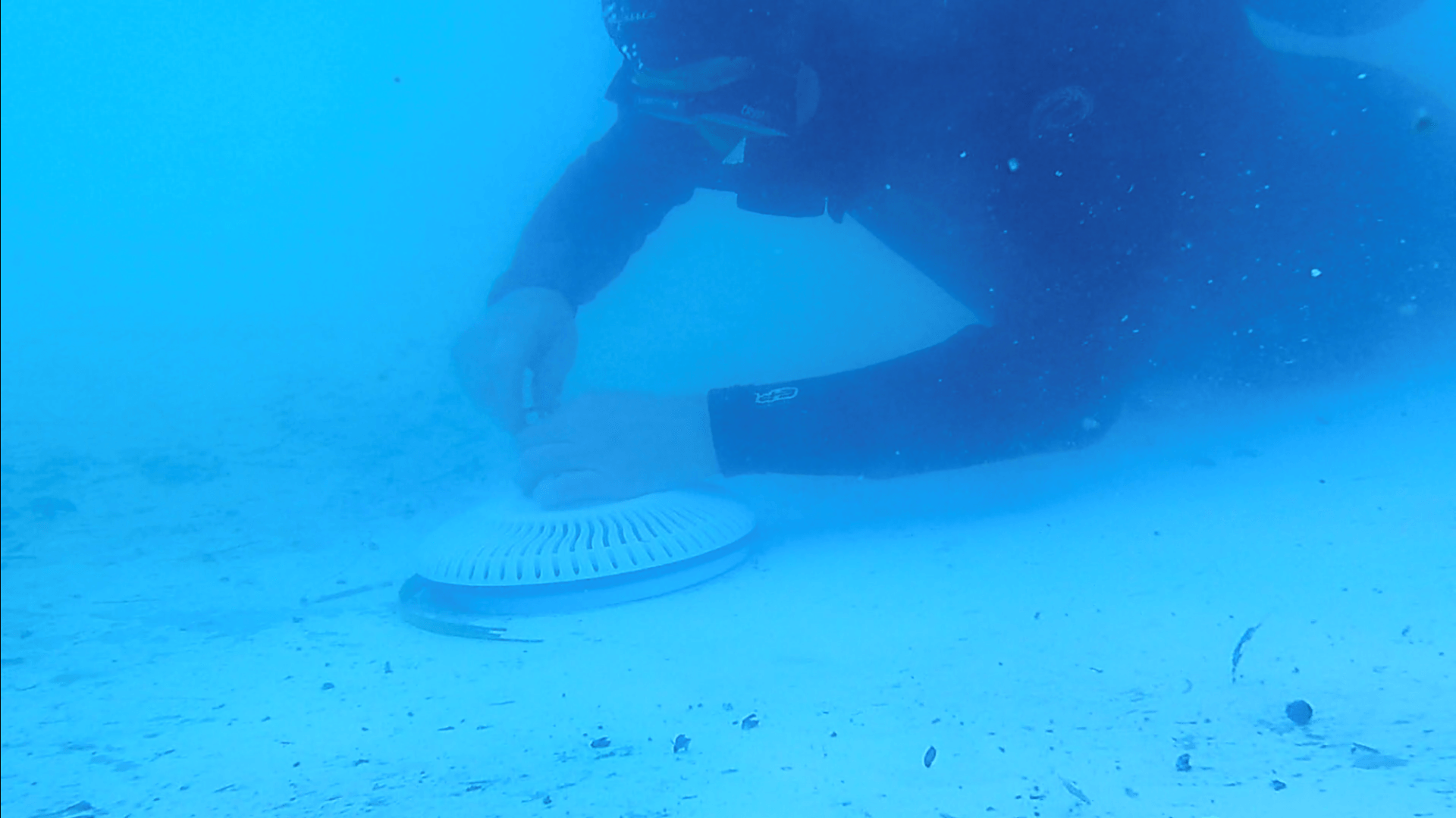 Scuba Diver Removing Swimming Pool Drain Cover | Denair, CA | JG Underwater Pool Service